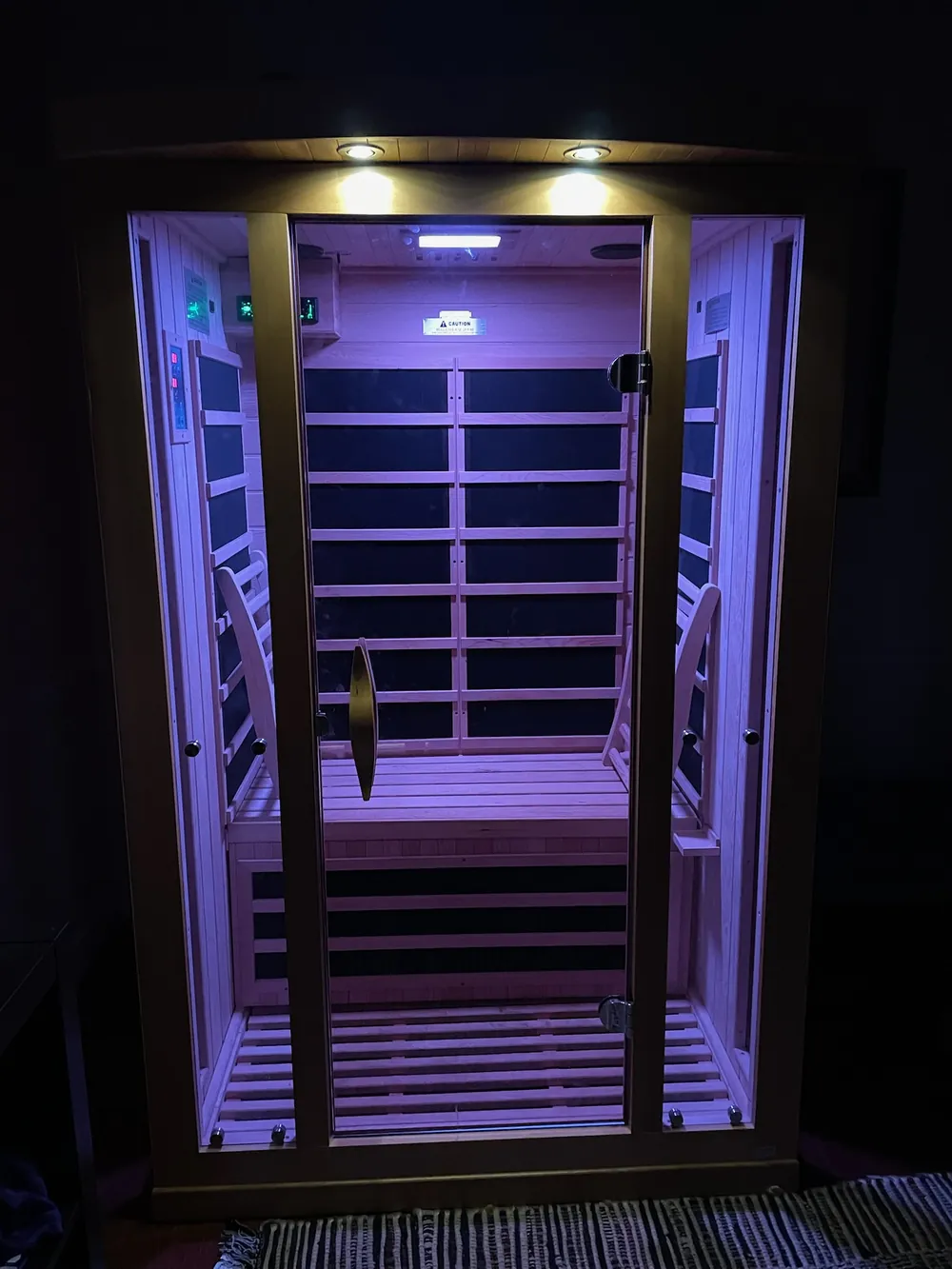 The sauna lit violet